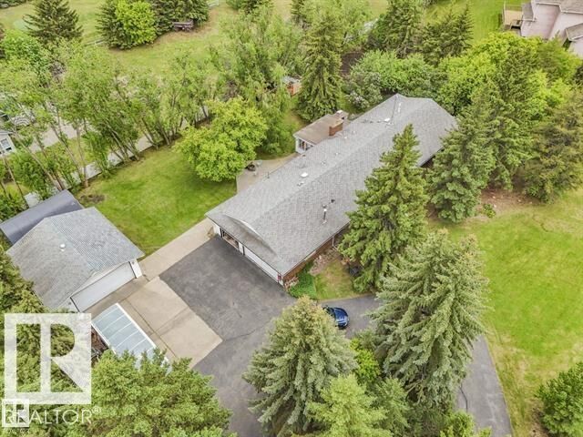 Property Photo: 11921 231 Street NW AB T5S 2C2