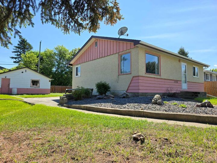 Property Photo: 10701 91 Street AB T8S 1R1