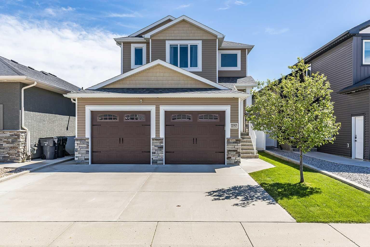 Property Photo: 597 Somerside View SE AB T1B 0R1
