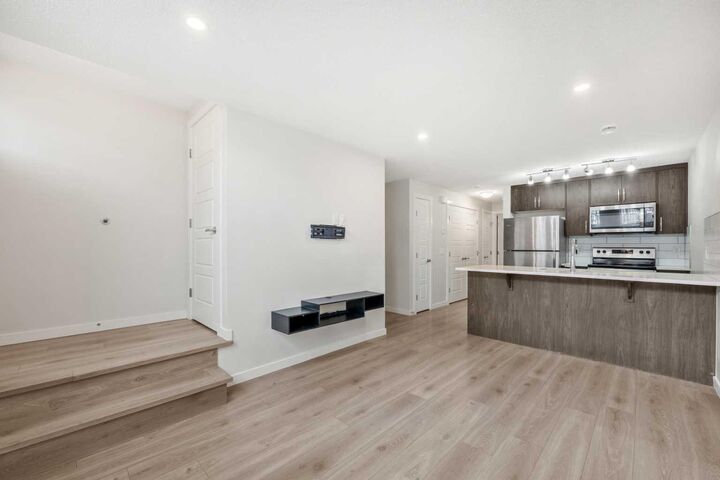 Property Photo:  167 Cranbrook Square SE  AB T3M 3E3 