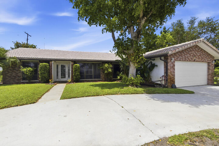 Property Photo: 1501 NW 7th Street FL 33486