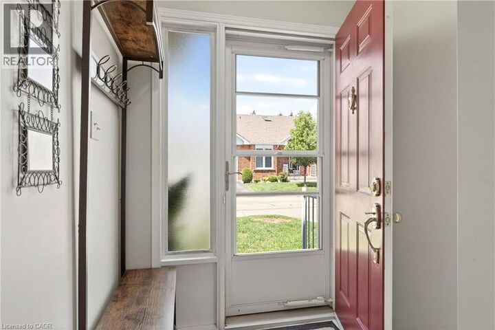 Property Photo: 25 Kitty Murray Lane 6 ON L9K 1L3