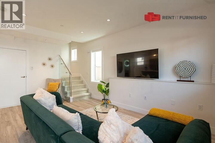 Property Photo:  3143 East 8th Avenue  BC V5M 1X5 