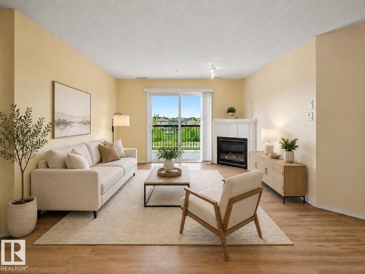 Property Photo: 2098 Blackmud Creek Drive SW 309 AB T6W 1T7