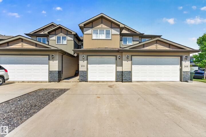 Property Photo:  311 Genesis Vi  AB T7Z 0J6 