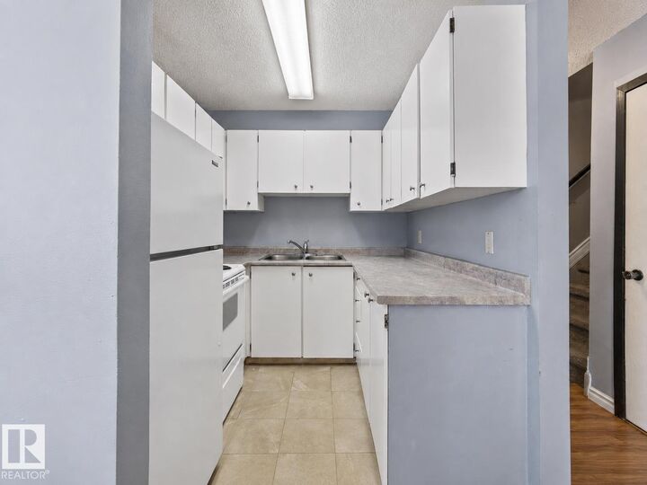 Property Photo: 13450 Fort Road NW 1 AB T5A 1C5