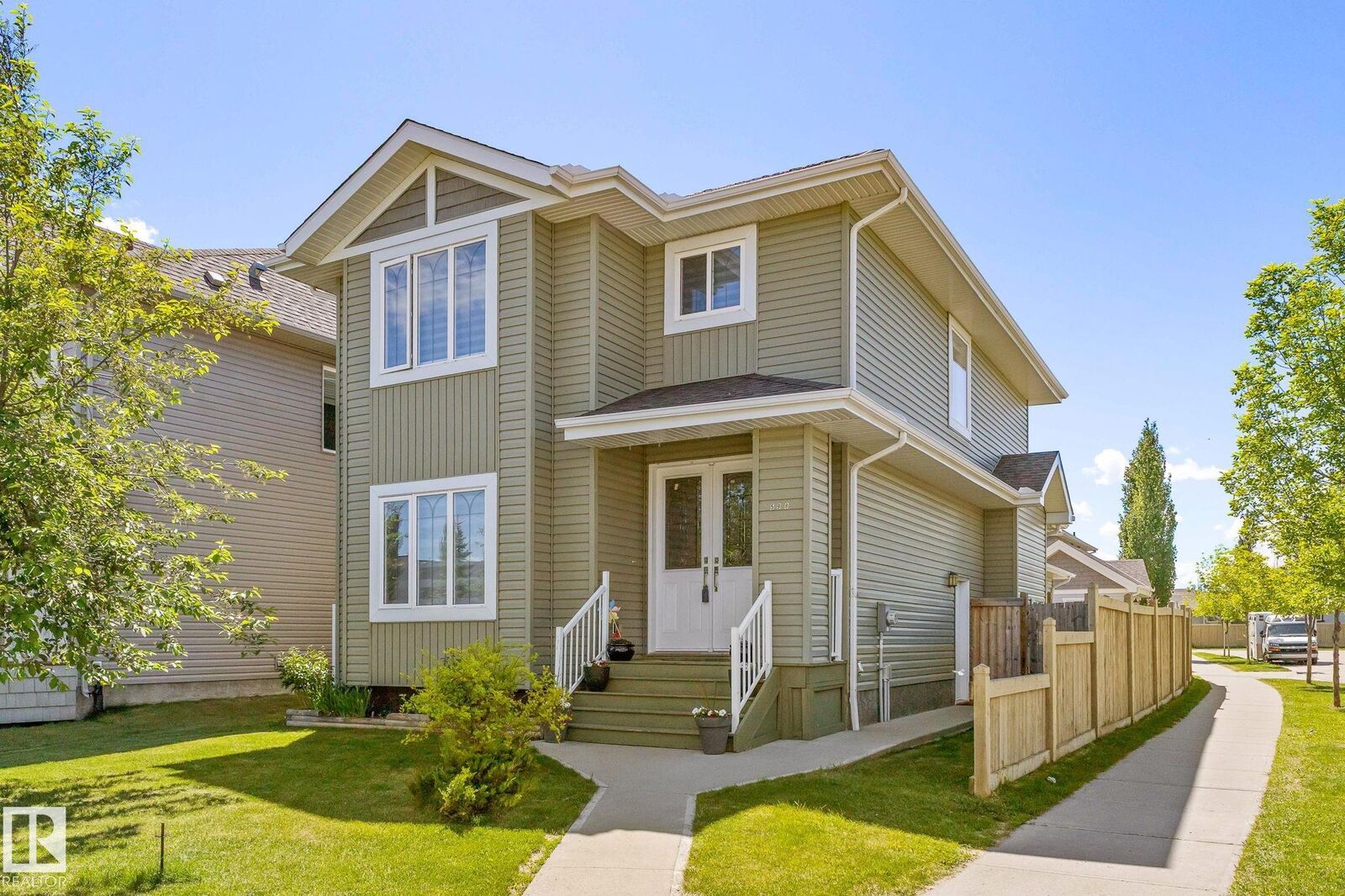 Property Photo: 598 Tamarack Road NW AB T6T 0M8