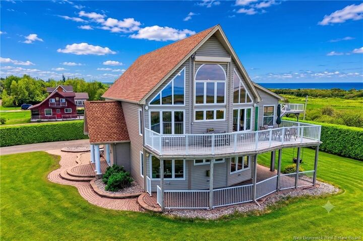 Property Photo: 128 Beau Rivage Drive NB E4N 1M6