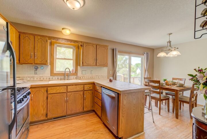 Property Photo:  6878 Upper 28th Street N  MN 55128 