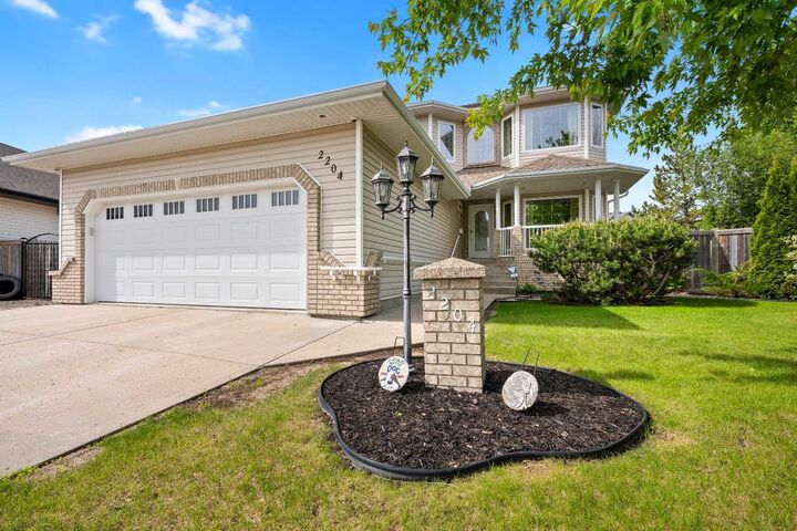 Property Photo: 2204 59A Avenue Close AB T9V 3J3