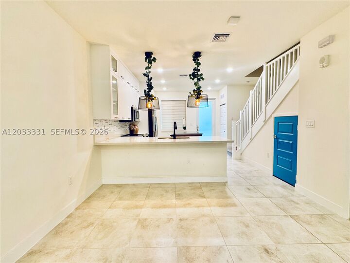 Property Photo:  10295 NW 64th Ter 104  FL 33178 