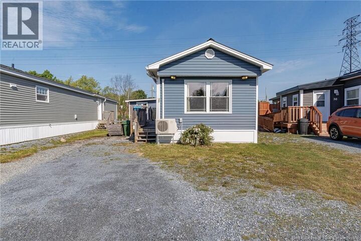 Property Photo:  32 Violet Street  NB E2M 5M3 