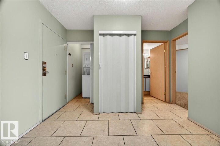 Property Photo:  6710 158 Avenue NW 112  AB T5Z 3A7 