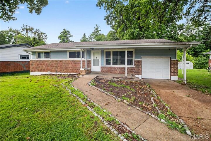 Property Photo:  2212 Collett Drive  MO 63136 