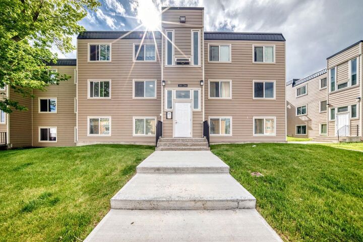 Property Photo:  315 Heritage Drive SE 203  AB T2H 1N2 