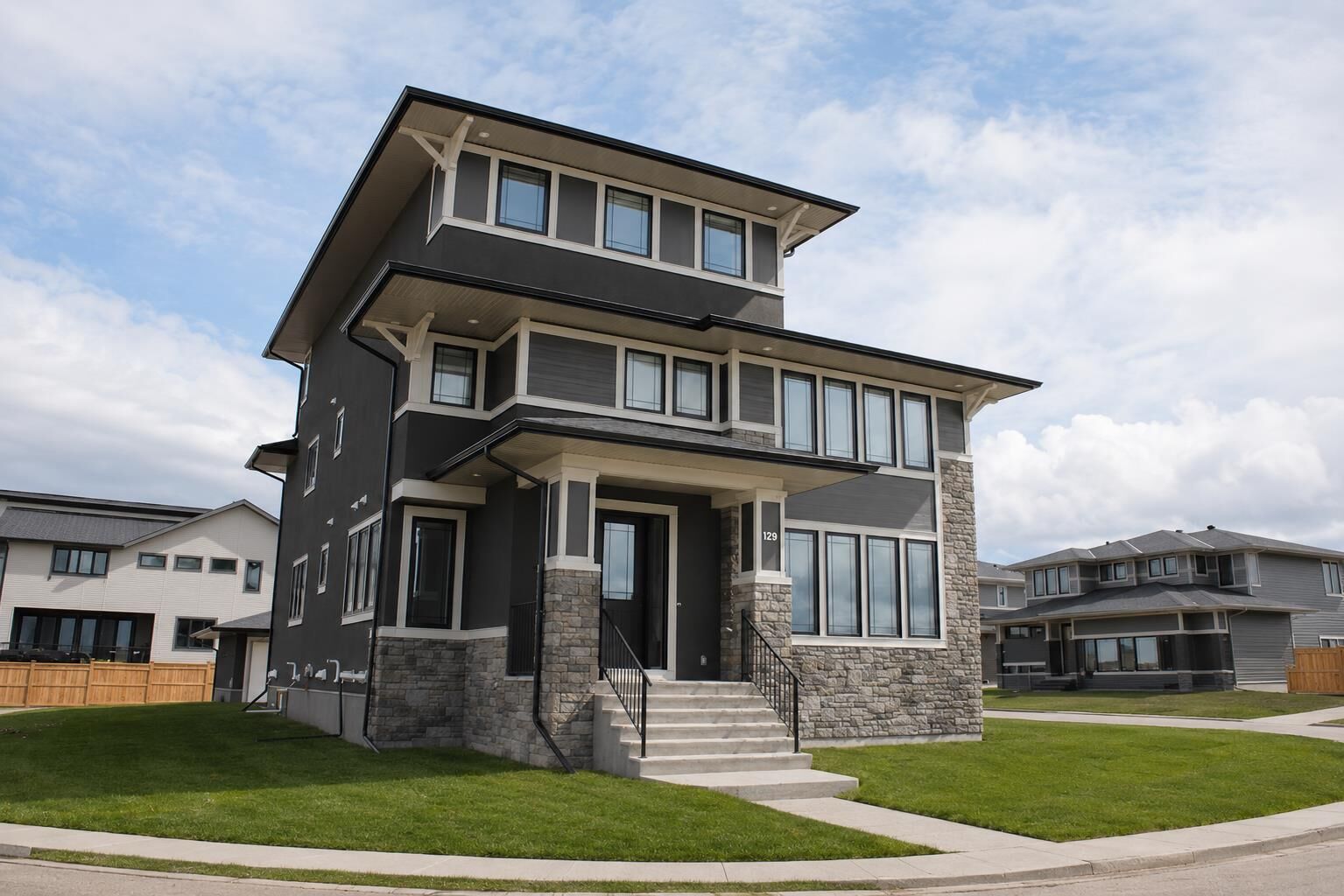 Property Photo: 129 South Harmony Drive AB T3Z 0C5