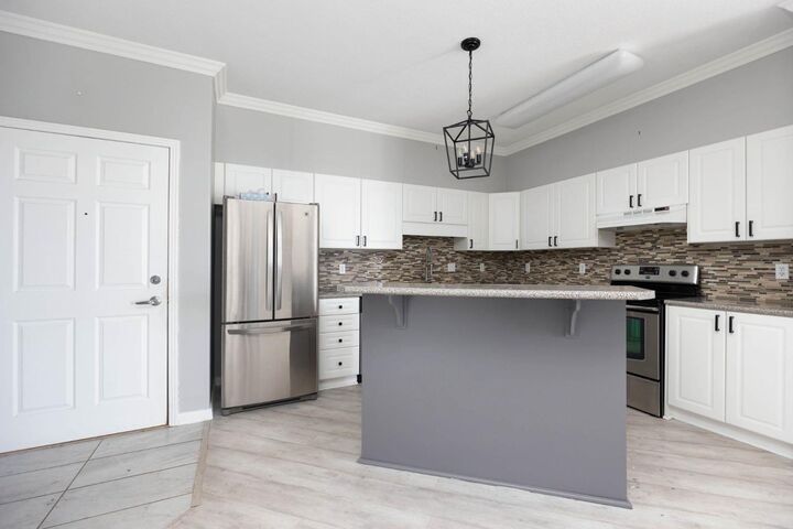 Property Photo:  1095 Timberline Drive 201  AB T9K 1Y7 