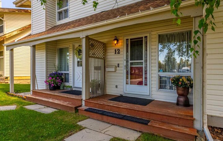 Property Photo: 12 Woodhill Road SW AB T2W 3P2