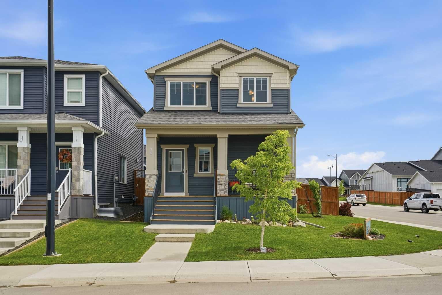 Property Photo:  30 Juniper Street  AB T1S 5S2 