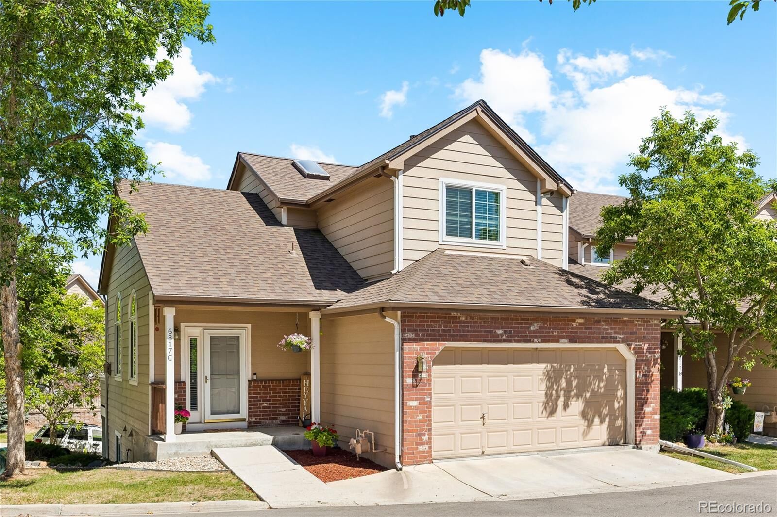 Property Photo:  6817 S Webster Street C  CO 80128 