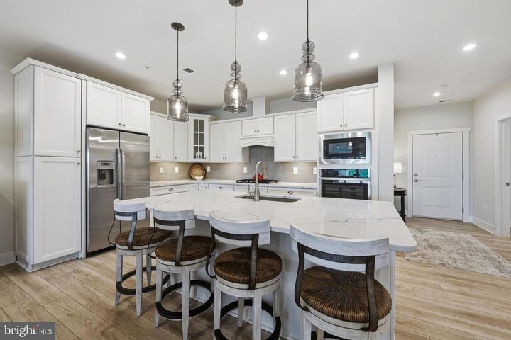 Property Photo:  1000 Herons Nest Way 403  MD 21619 