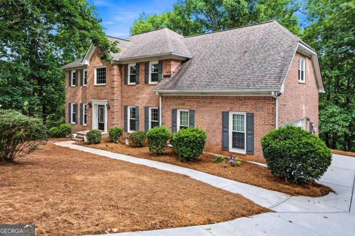Property Photo: 5525 Hampstead Way GA 30097