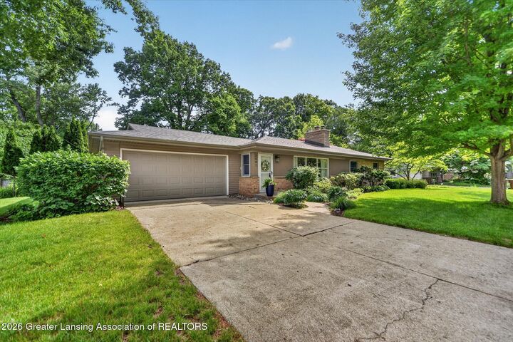 Property Photo:  2401 Shawnee Trail  MI 48864 