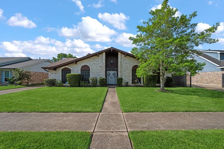 Property Photo: 8834 Sandstone Street TX 77036