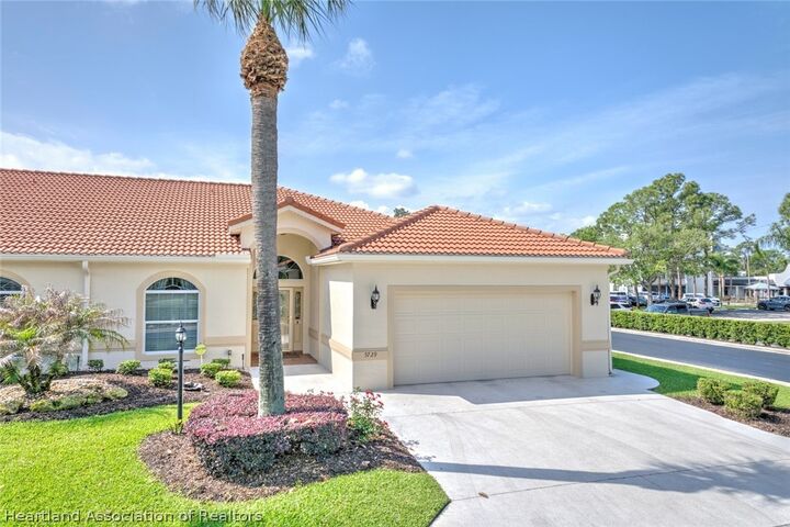 Property Photo: 5729 Hampton Woods Boulevard FL 33872