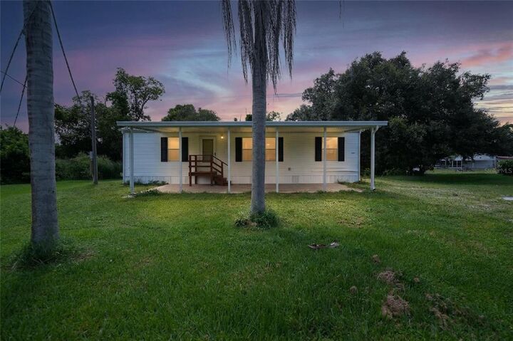 Property Photo:  1289 SW Avocado Drive  FL 34266 