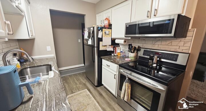 Property Photo:  505 John Anderson #57 Court 57  MI 48162 