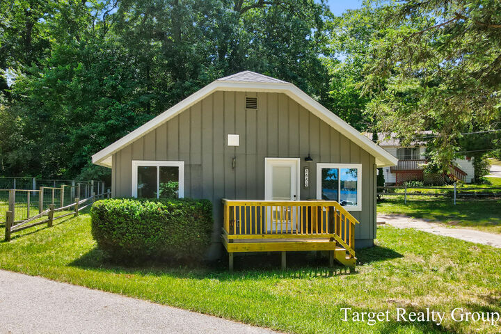 Property Photo: 8660 Merry Drive NE MI 49341