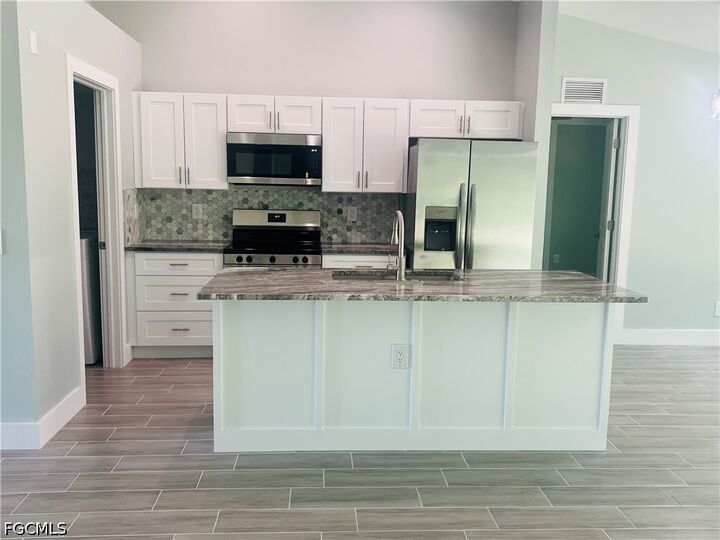 Property Photo: 4169 NW 38th Place FL 33993