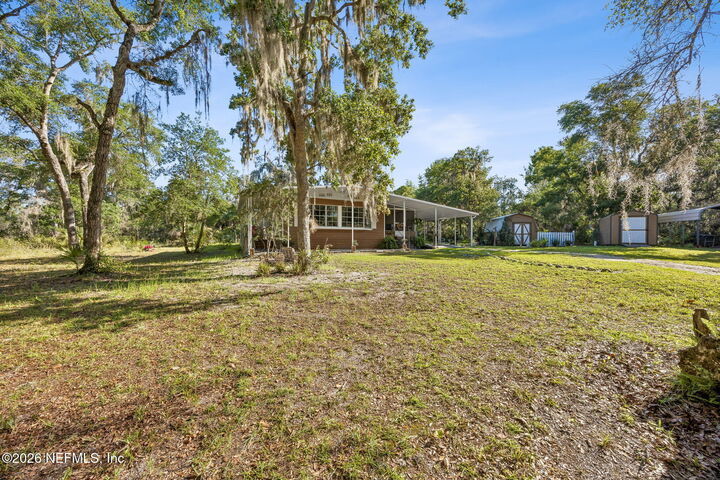 Property Photo:  110 Plumosa Drive  FL 32139 