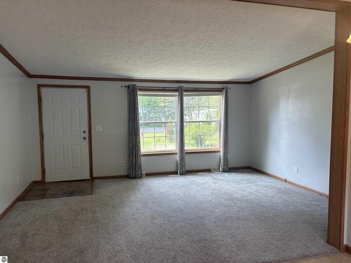 Property Photo:  714 Golfview Circle  MI 49629 