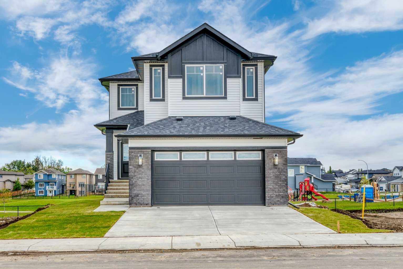 Property Photo:  112 Lakewood Crescent  AB T1P 2J9 