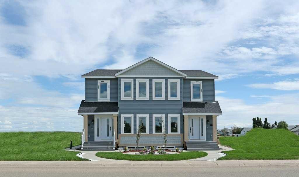 Property Photo: 412A Meadowbrook Drive E AB T1R 1N7