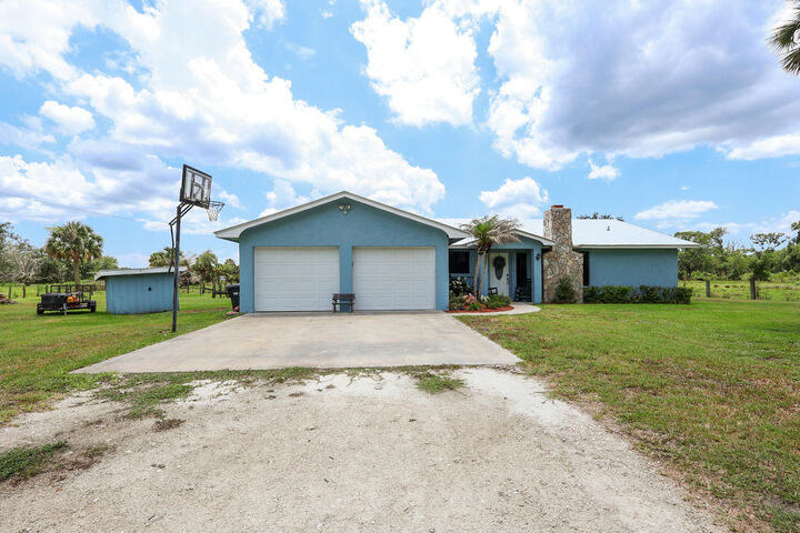 Property Photo: 860 NW 141st Street FL 34972