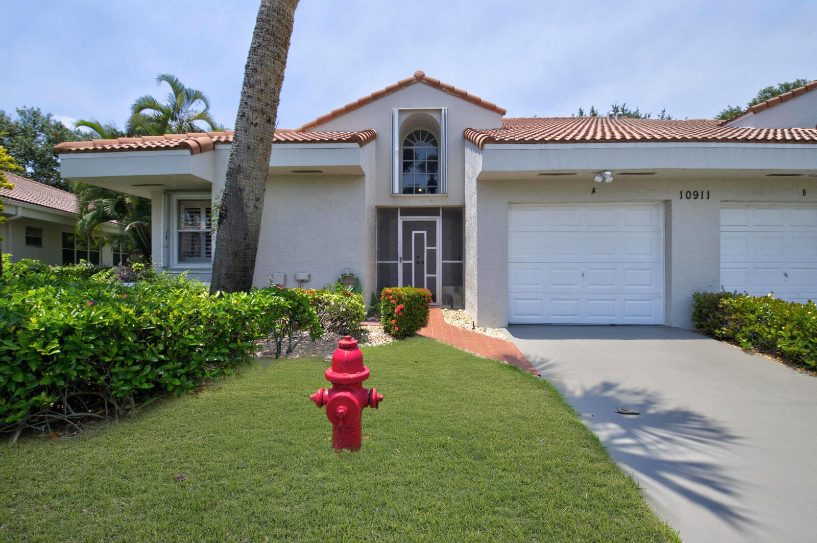 Property Photo:  10911 Ladera Lane A  FL 33498 