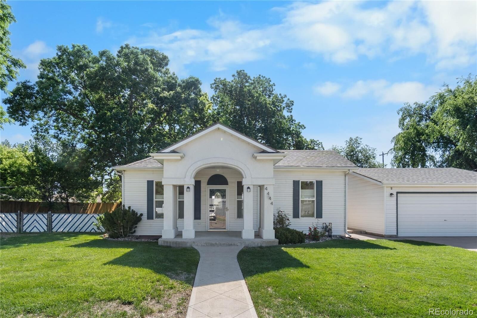 Property Photo:  4444 S Lincoln Street  CO 80113 