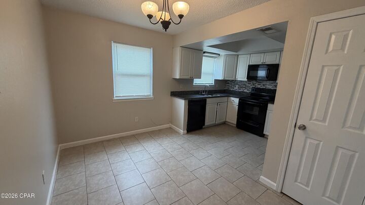 Property Photo:  3914 E 11th Street 402  FL 32404 