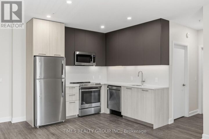 Property Photo:  369 Hunter Street West 202  ON K9H 2M5 