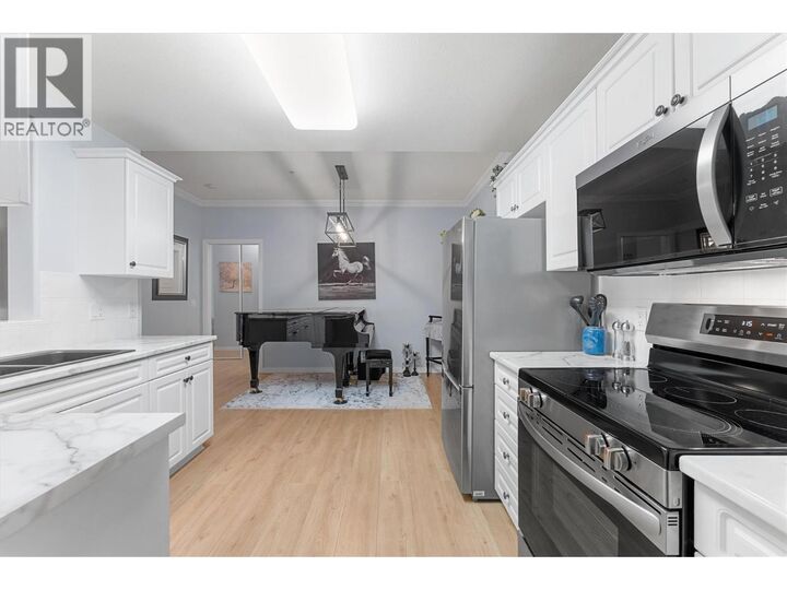 Property Photo: 1962 Enterprise Way 113 BC V1Y 9S6