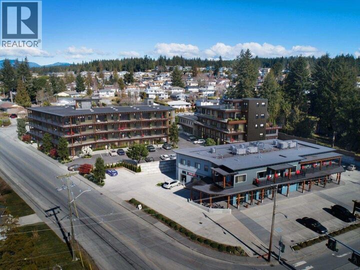 102-7020 Tofino Street — photo 1