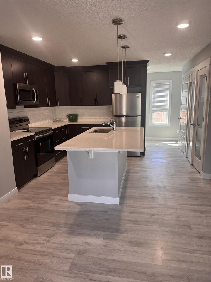 Property Photo:  1313 Chappelle Boulevard SW  AB T6W 3S2 