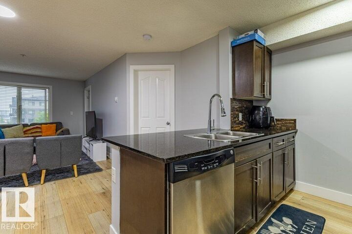 Property Photo:  11820 22 Avenue SW 306  AB T6W 2A2 