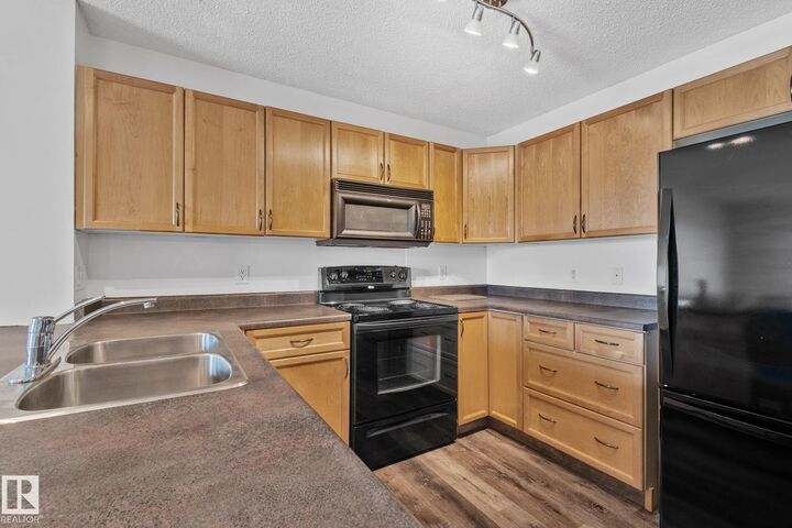 Property Photo:  13830 150 Avenue NW 207  AB T6V 1X2 