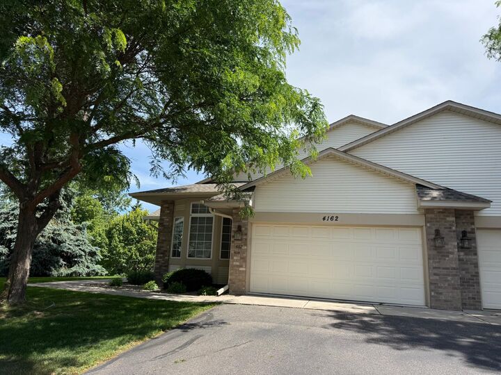 Property Photo: 4162 N Black Oaks Ln N MN 55446
