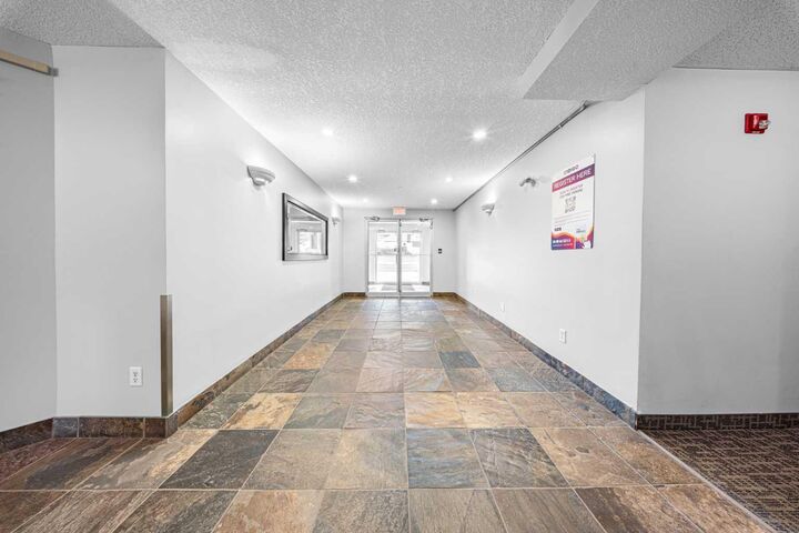 Property Photo: 70 Panamount Drive NW 1104 AB T3K 6K3