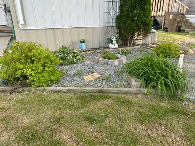 Property Photo: 56 Greenbrook Village E AB T1R 0R7
